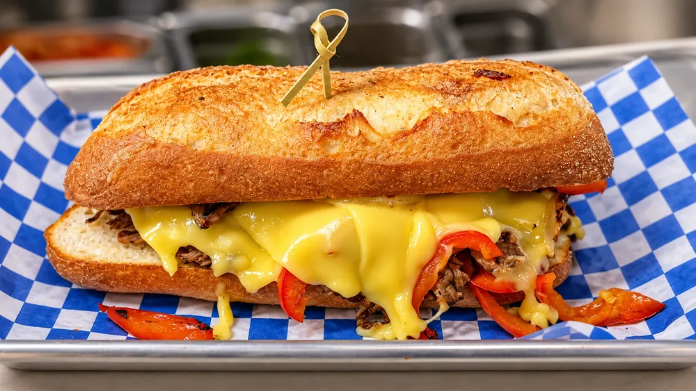 Fremont Philly sandwich with melted vegan cheese and peppers